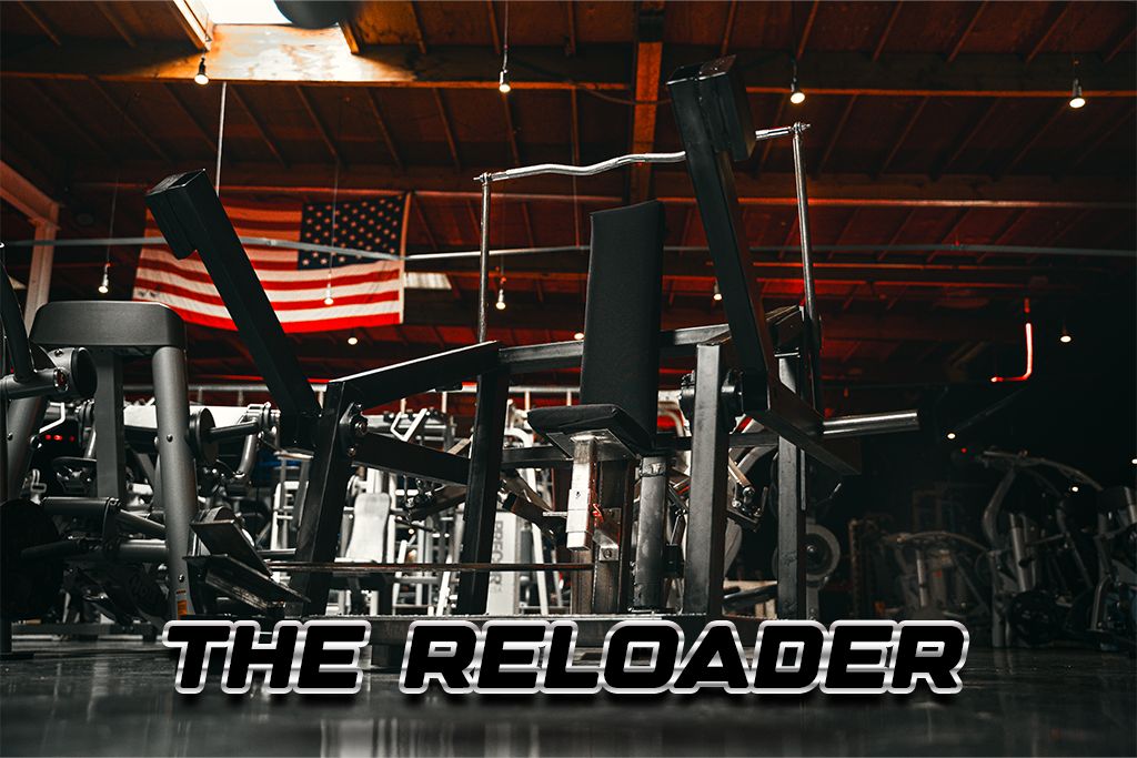 The Reloader machine with black pads and steel arms